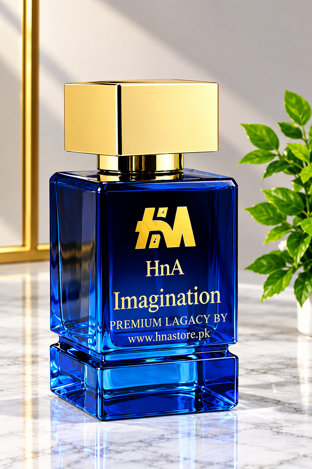 A blue glass perfume bottle with a gold cap, labeled 'HnA Imagination Premium Legacy' by Hn Store, set on a marble surface with a gold mirror and green leaves in the background.